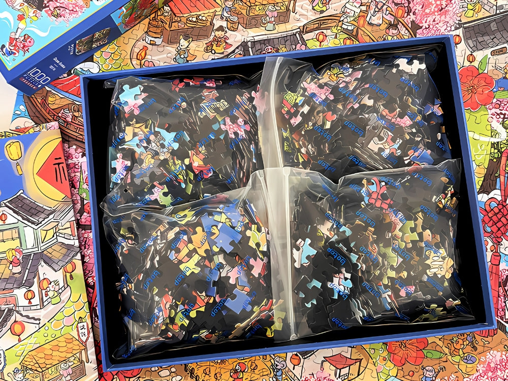 Inside the BOTOP puzzle box showing 1000 pieces packed in 4 separate bags as part of the BlackCard series