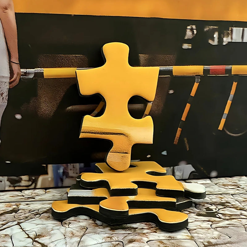 Stack of puzzle pieces showing the yellow train from the sakura train puzzle