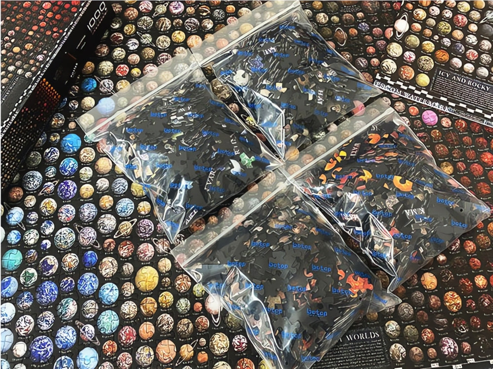 Botop puzzle showing four clear bags of sorted pieces laid over cosmic planetary background