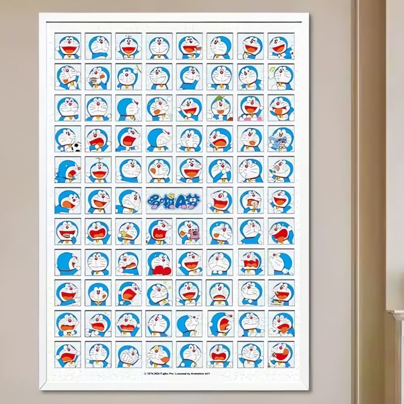 Framed Doraemon puzzle featuring rows of cartoon facial expressions on white border