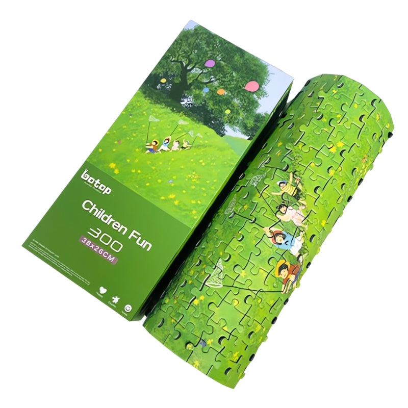 Puzzle box and rolled completed puzzle featuring children playing in a green field.