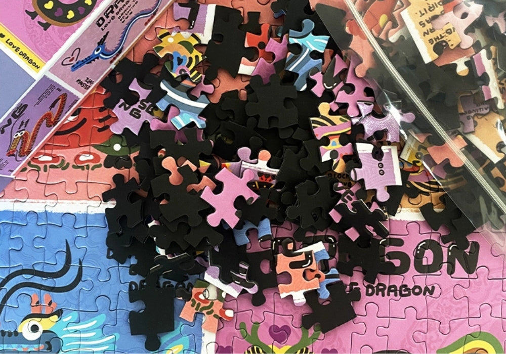 Scattered Lucky Loong puzzle pieces with bright dragon patterns and black backs