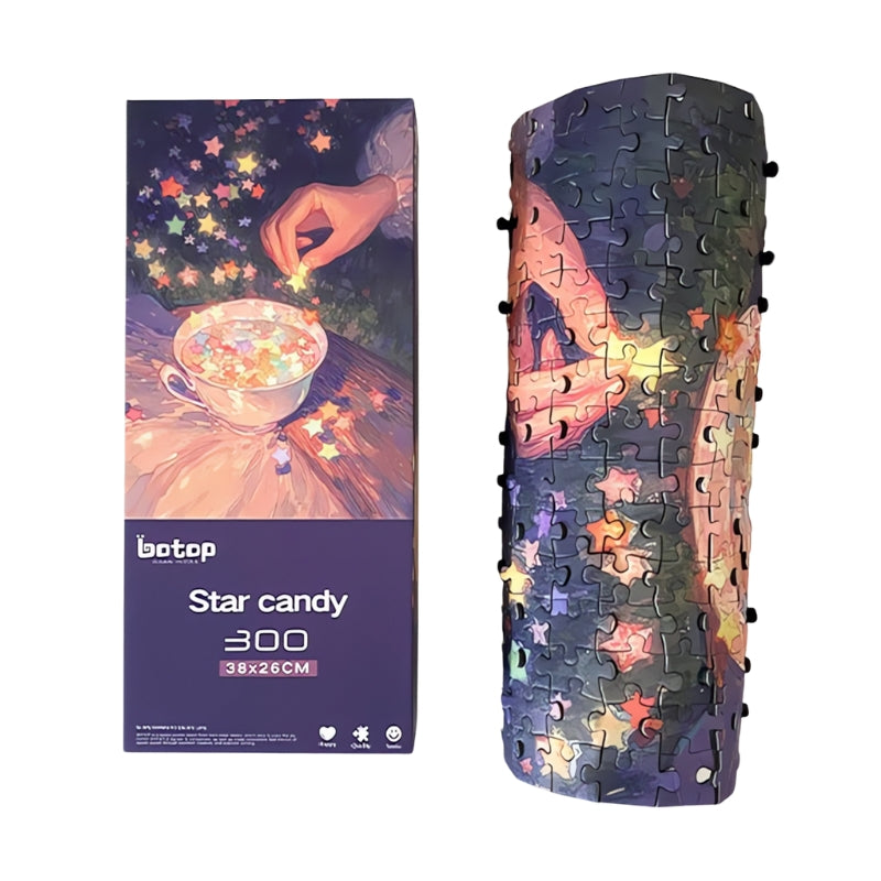 Assembled Star Candy puzzle rolled up beside the box showing vibrant colours and glowing stars.