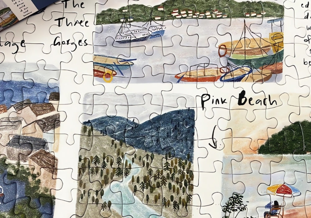 Partially completed Botop Travel puzzle showing boats, beach, and mountain scenes.