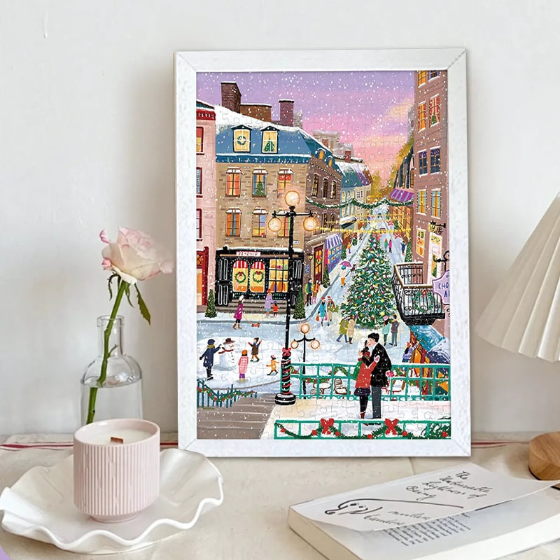 Framed Botop Christmas Song puzzle displayed on a desk with rose and candle.