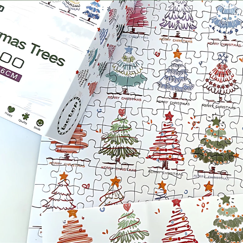 Christmas Trees puzzle partially assembled, with the box and several decorated tree designs visible