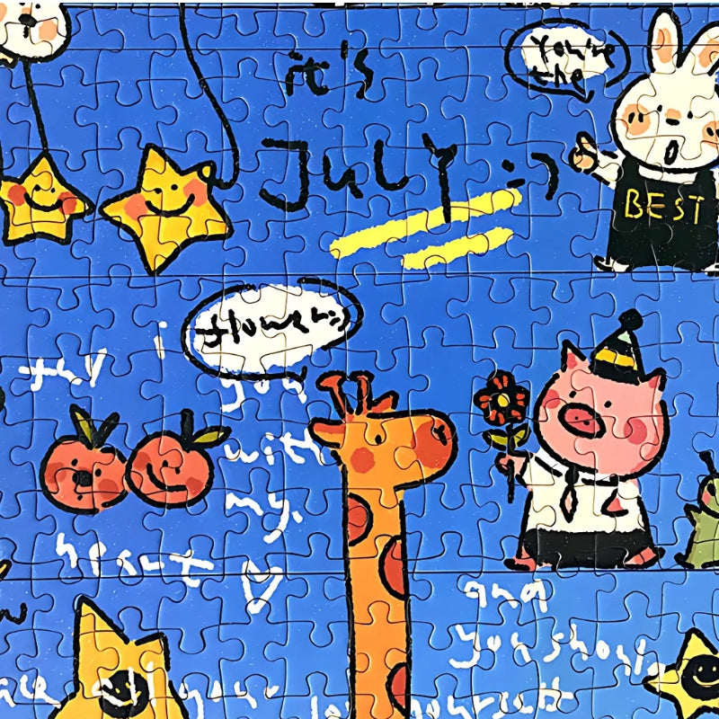 Detailed view of the completed Good Day puzzle showing a giraffe, pig, stars and July-themed cheerful design