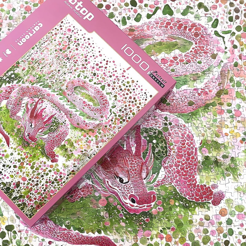 Dots Dragon puzzle box over finished puzzle showing the dragon's scales and colourful speckled design.
