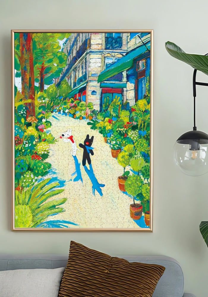 Botop Gaspard et Lisa Paris puzzle art framed above a sofa