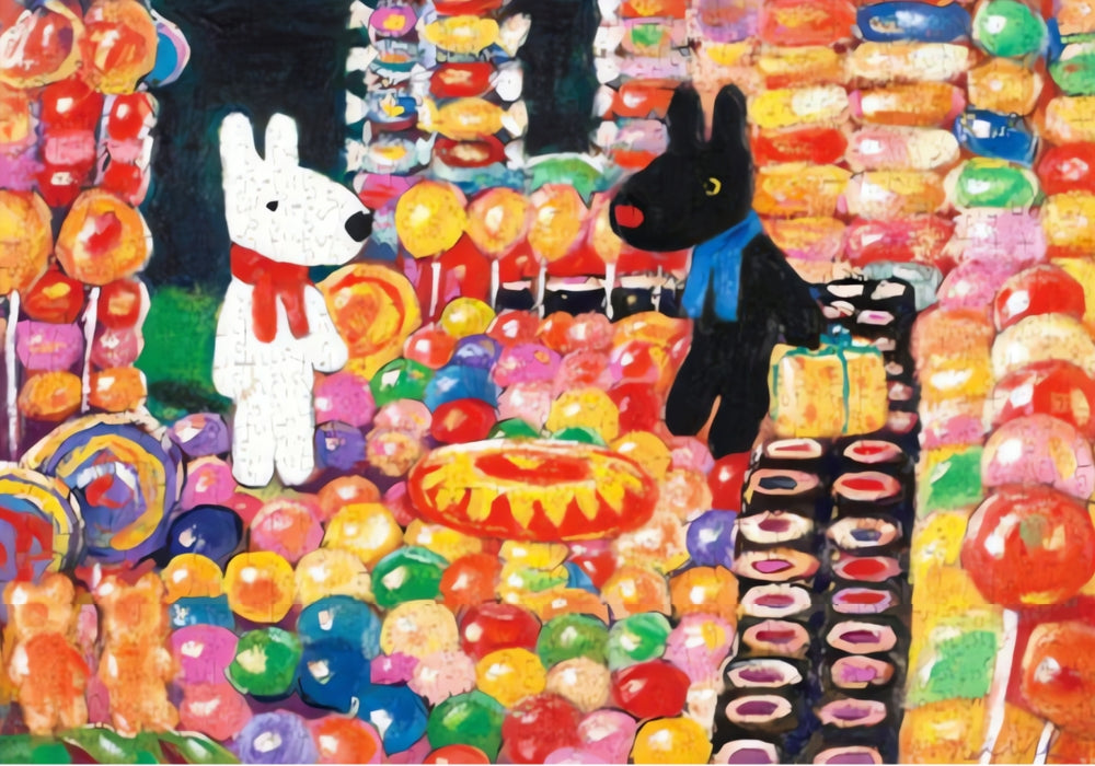 Gaspard and Lisa surrounded by rainbow sweets, lollies, and colourful balloons