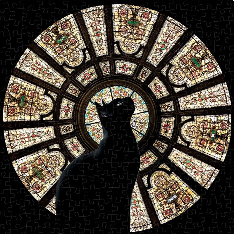 Finished round puzzle of a black cat sitting in front of a detailed stained glass dome
