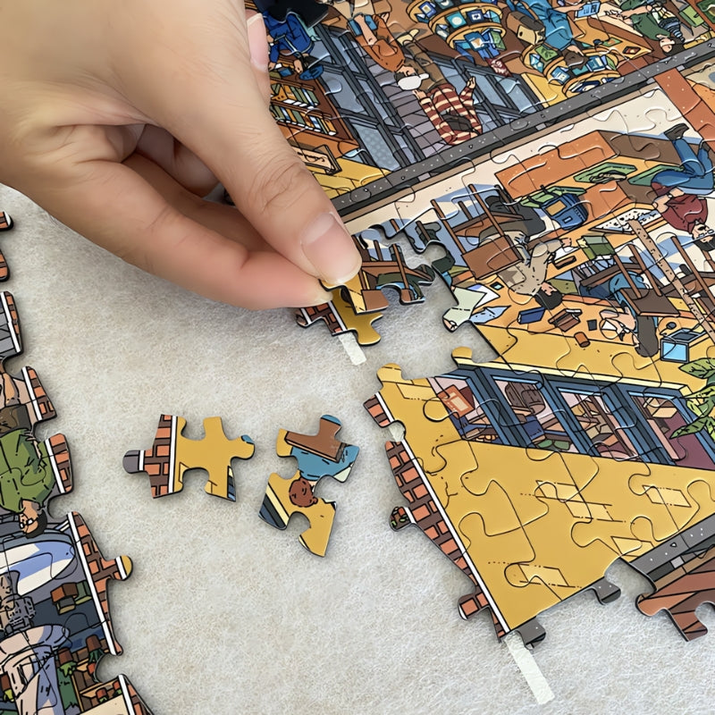 Hand placing piece into edge of The Bookstore puzzle during assembly