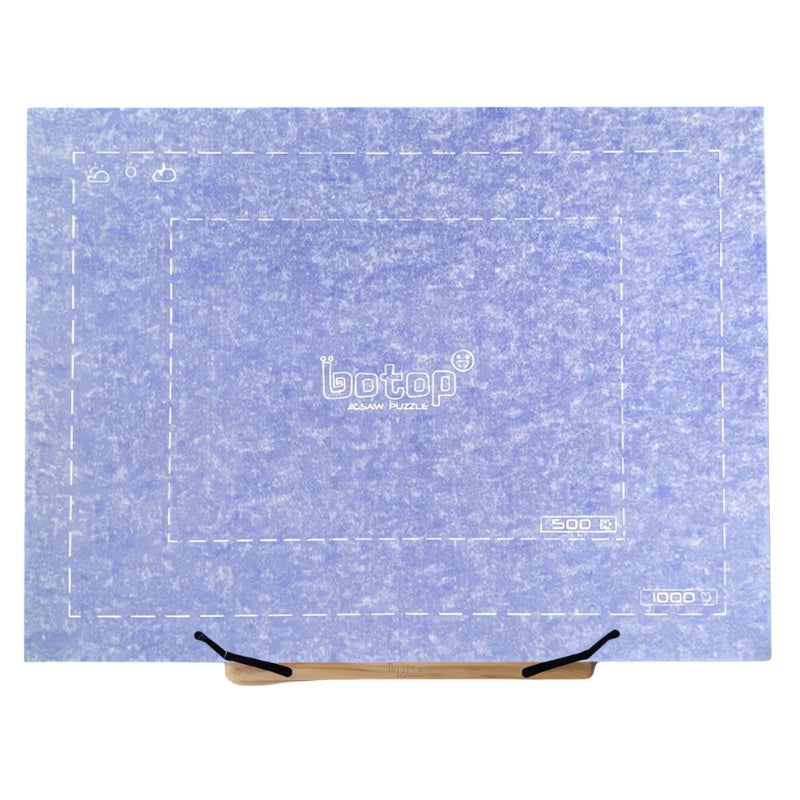 Foldable puzzle board in ice blue displayed on a wooden adjustable easel.