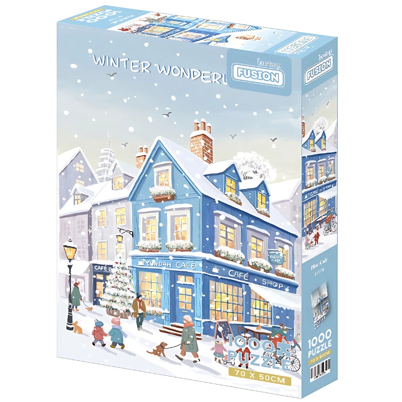 Box image of the Blue Cafe puzzle showing a snow-covered cafe and street scene with holiday charm.