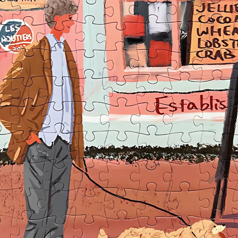 Close-up of puzzle with man walking dog outside café – seaside town puzzle.