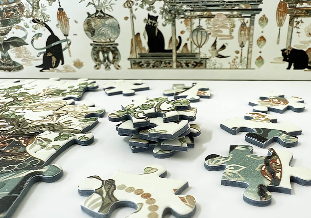 Puzzle pieces from Song Dynasty puzzle showing glossy finish and floral designs