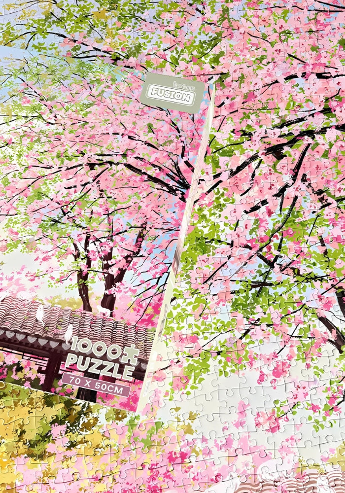 Spring on Earth puzzle assembled with box placed on top, showcasing design accuracy and soft floral palette.