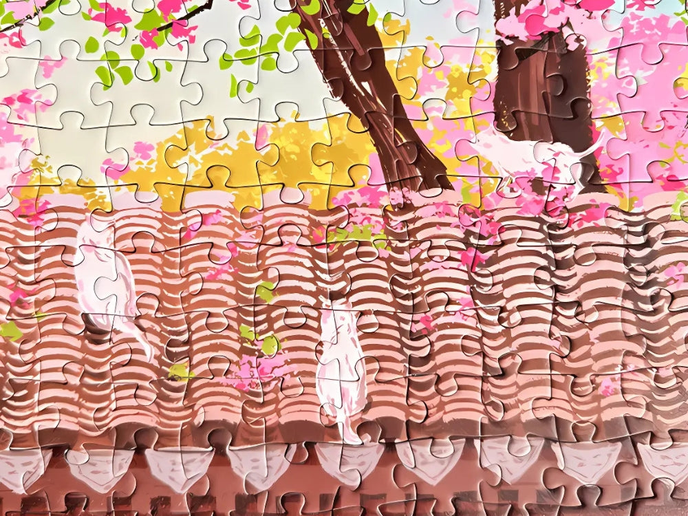 Detailed section of the Spring on Earth puzzle showing white cats walking across a rooftop under cherry blossoms.