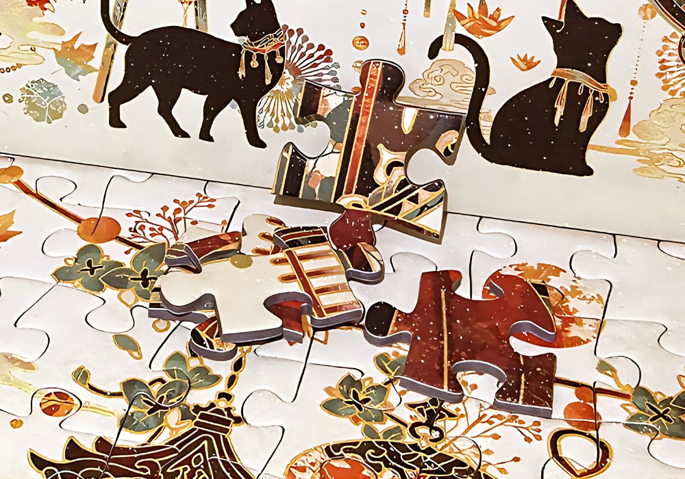 Puzzle pieces close-up from Tang Dynasty set showing gold foil details and colour accents