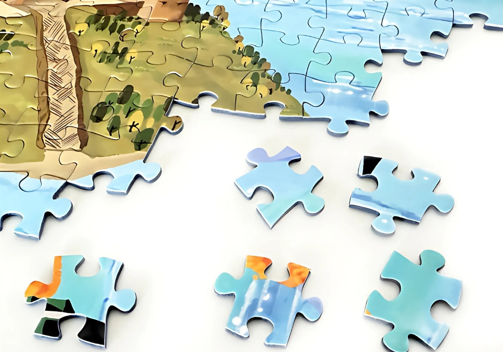 Close-up of loose puzzle pieces from Wizarding World puzzle showing sky and castle edge