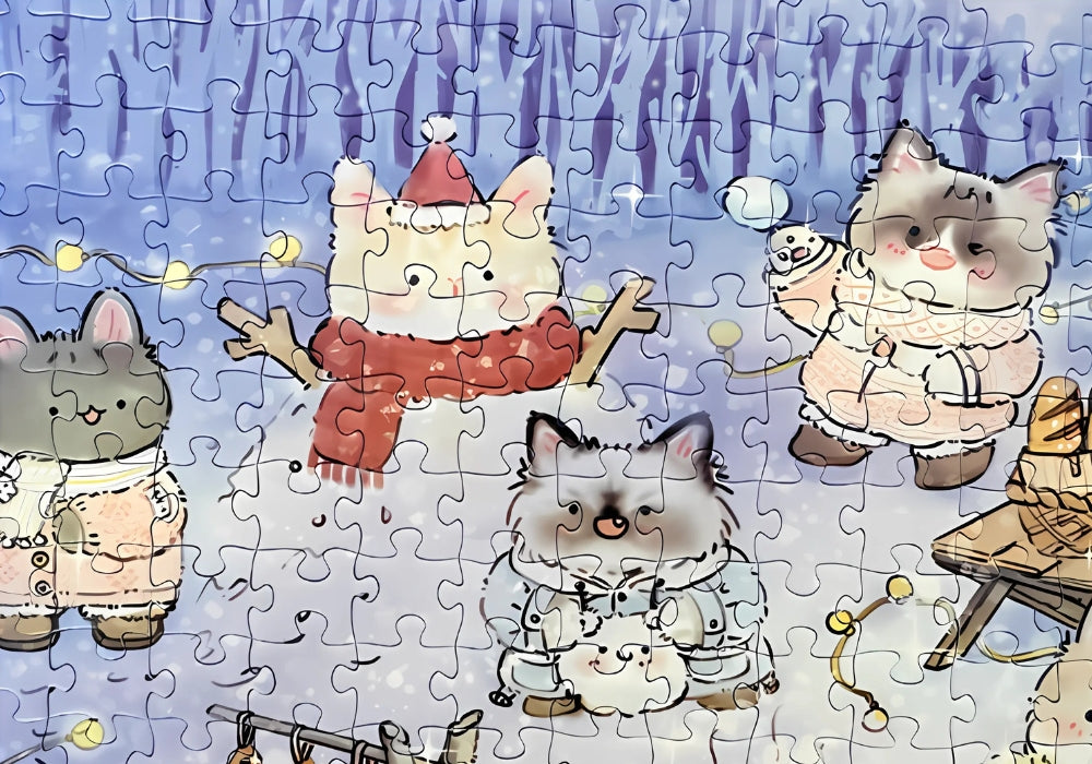 Puzzle close-up showing a cat snowman, playful cats, and cosy winter outfits under a fairy-lit sky.