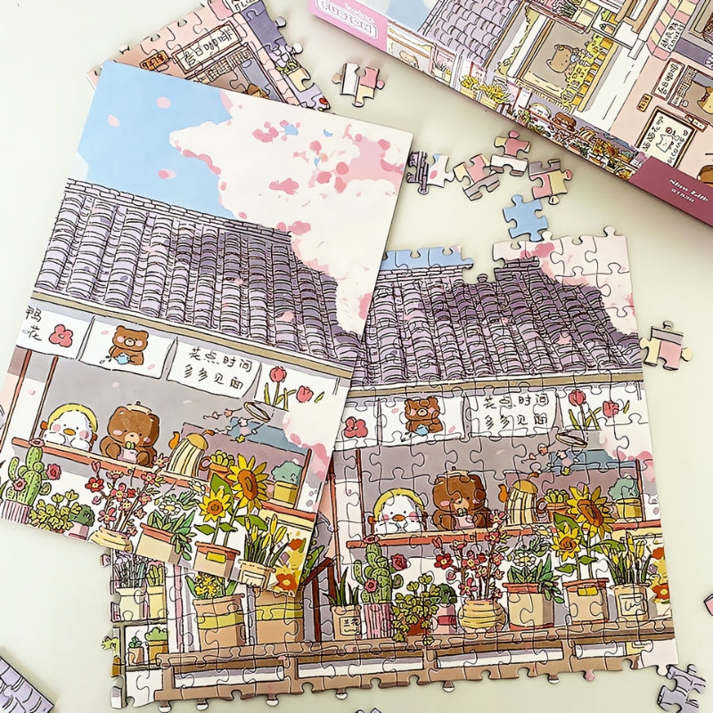 Close-up of partially completed Happy Apartment puzzle showing cartoon bears and flower pots on a tiled rooftop.