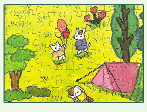 Close-up of puzzle showing fine details of two animal characters holding balloons near a tent.