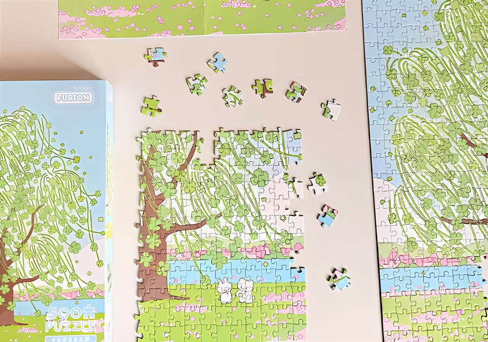 Lucky Tree puzzle in progress with box, guide sheet and scattered pieces