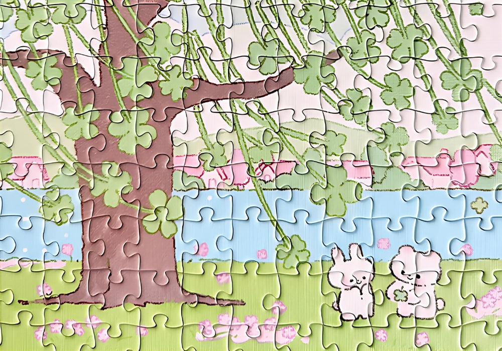 Close-up of Lucky Tree puzzle completed, showing tree trunk, clovers and tiny animals