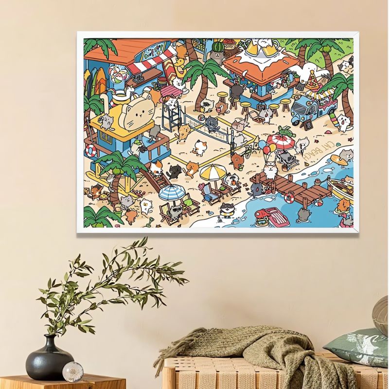 Framed Cat Beach puzzle displayed in a cosy room with light decor and indoor plant.