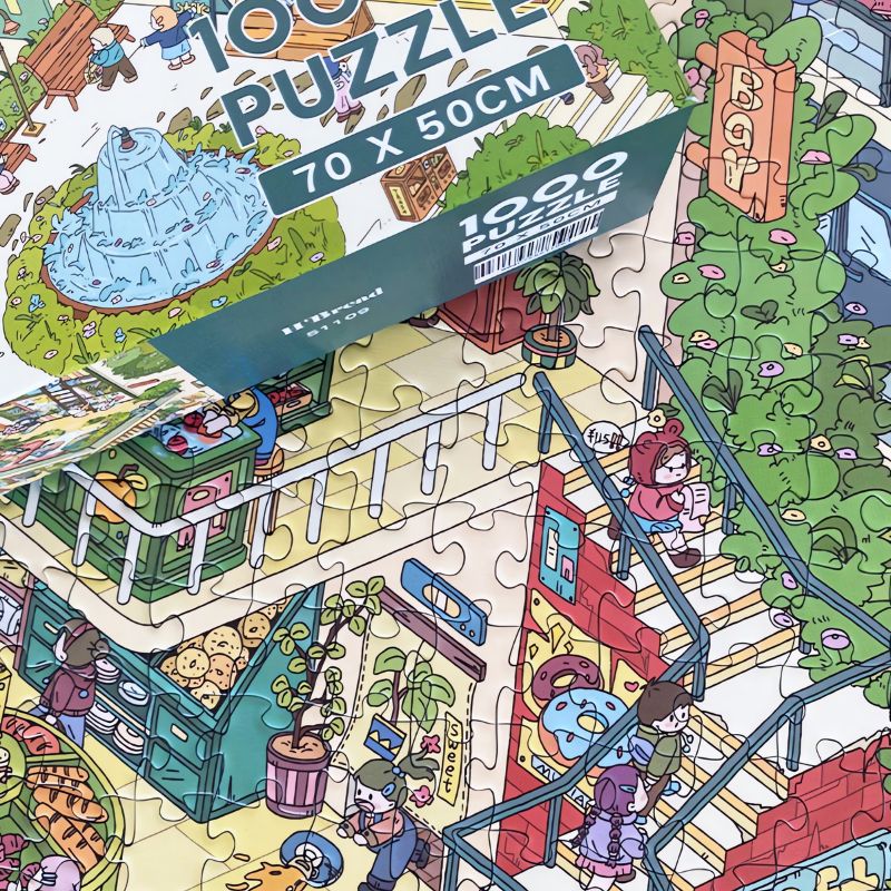 Close-up of assembled H'Bread puzzle with puzzle box showing bakery, greenery, and stair details.