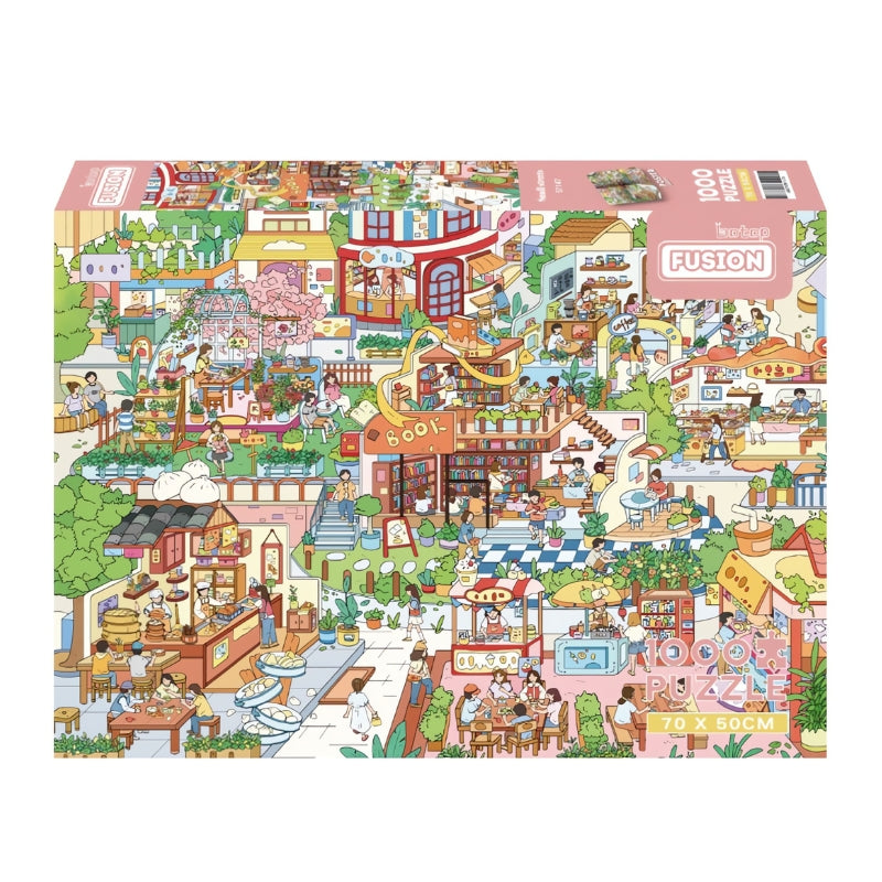 Small Streets 1000 piece puzzle box showing a lively town filled with bookstores, cafés, and local shops.