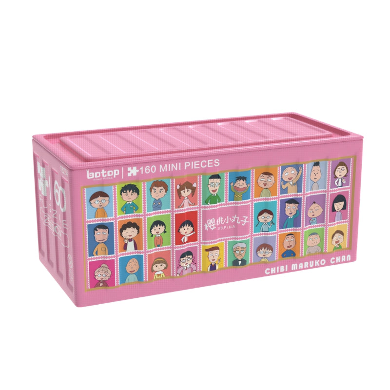 Botop mini puzzle in pink box featuring grid of Chibi Maruko-chan character faces.