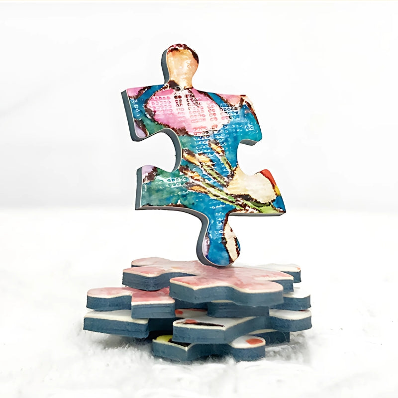 Close-up of a thick puzzle piece from Journey in the Sky with a textured surface.