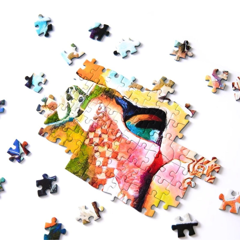 Partially completed section of Colourful Keytime 1000 piece puzzle showing cat’s eye and intricate abstract details.