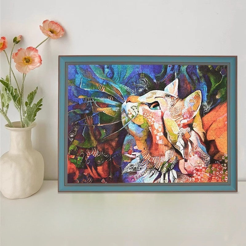 Framed completed Colourful 1000 piece Keytime puzzle featuring abstract cat portrait in vibrant colours.