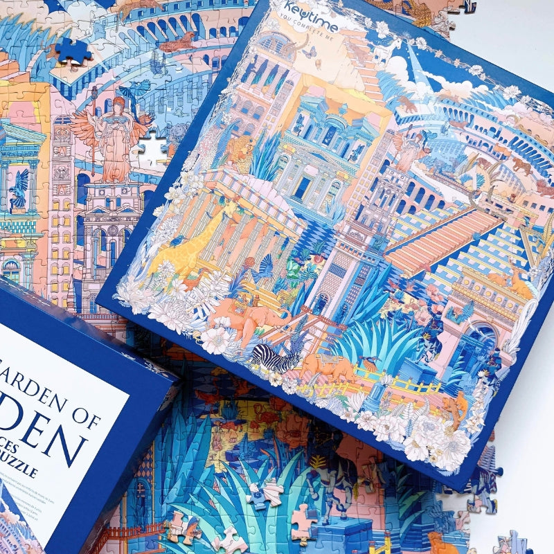 Garden of Eden Keytime 1000 piece jigsaw puzzle box on top of partially completed architectural and wildlife scene.