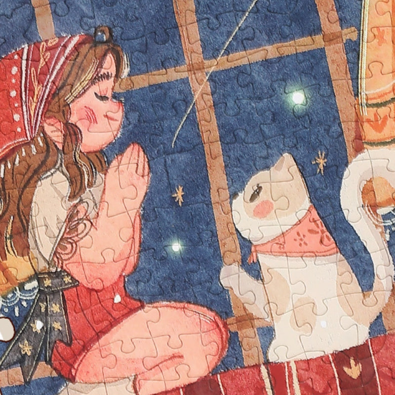A close-up view of the completed The Witch's Wish puzzle, focusing on the central scene of a girl on her bed facing her cat. The puzzle piece lines are visible, with warm earthy colors and soft lighting enhancing the magical atmosphere.