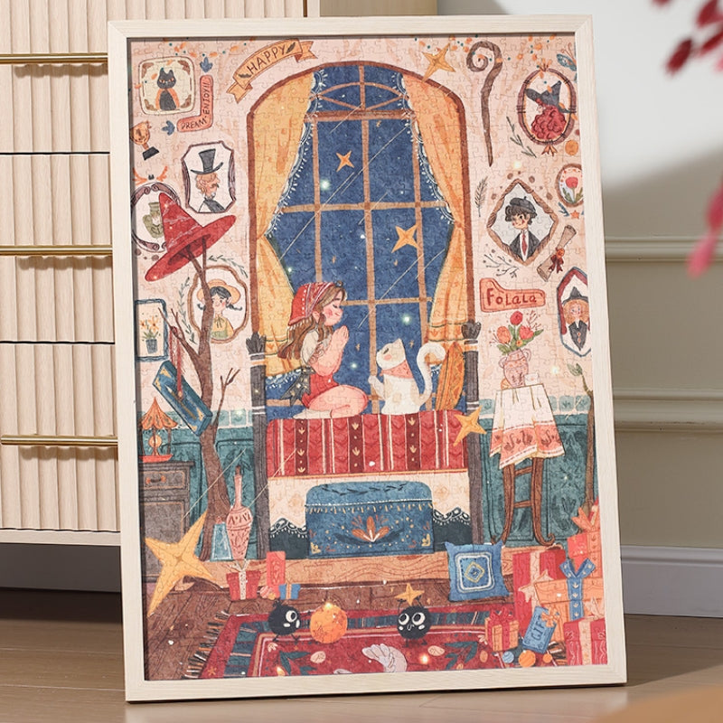 The completed The Witch's Wish puzzle framed in light wood, displayed leaning against a wall. The illustration shows a girl and her cat in a cozy, starry bedroom with whimsical decorations and warm, magical details.