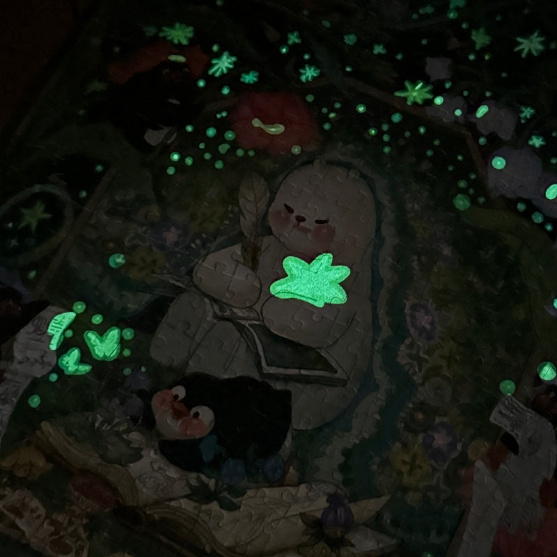 Bedtime Story puzzle glowing in the dark with illuminated stars, butterflies, and magical accents.