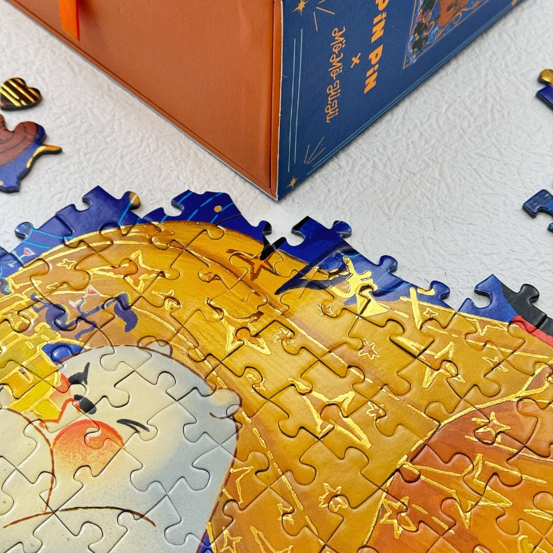 Partially assembled Blues Night puzzle with bright golden foil gramophone pieces near the box.