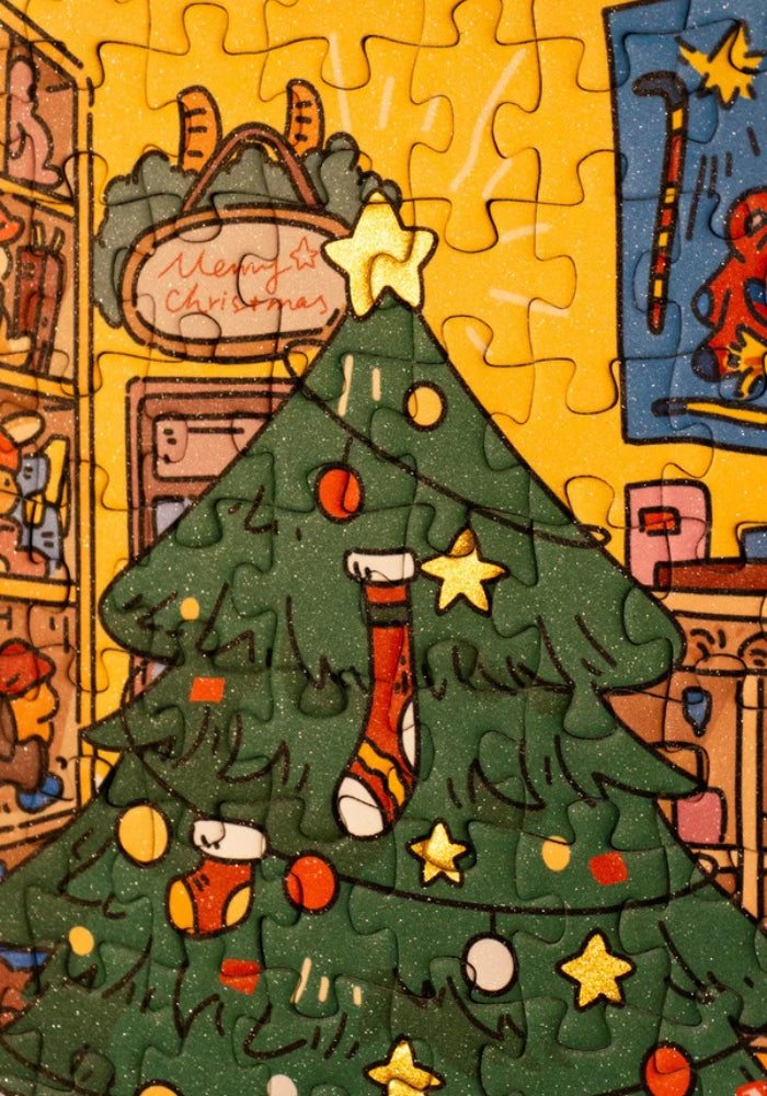 Close-up of completed Christmas Windows puzzle showing tree with stockings and ornaments in glitter finish