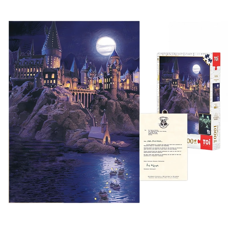 Flat lay of full Hogwarts Castle puzzle set with box, completed puzzle and Hogwarts letter.