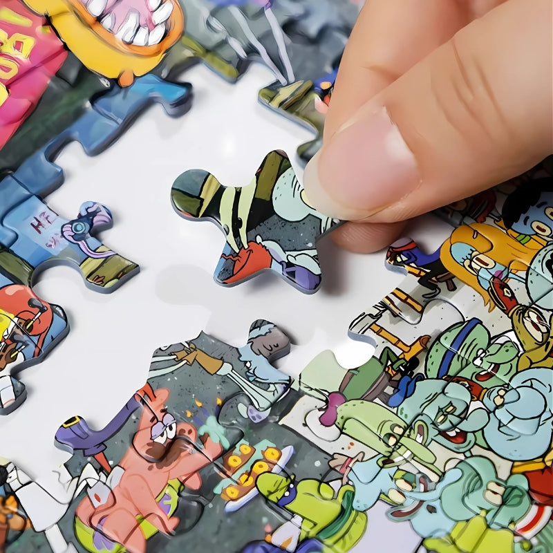 Close-up of hand placing a shaped puzzle piece from SpongeBob Series - Under the Sea puzzle