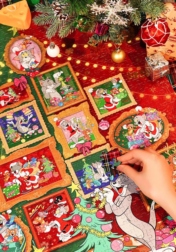 Hand placing a piece in the colourful Christmas Memoirs puzzle with detailed Tom and Jerry scenes.