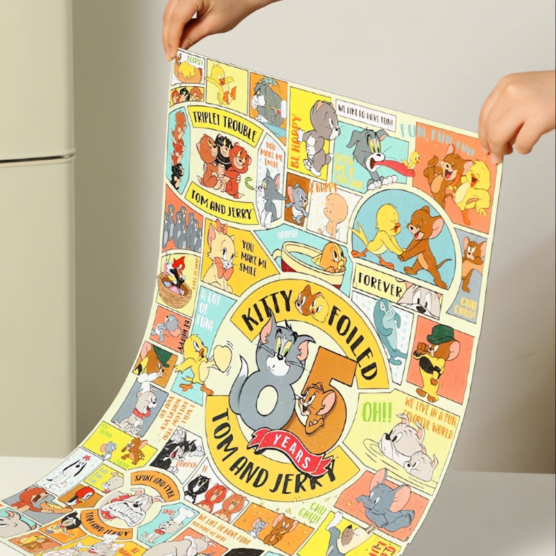 Hands holding up the completed Our Memories puzzle with vintage-style comic frames.