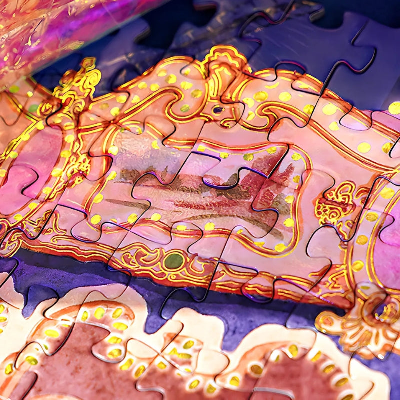 Close-up of puzzle pieces showing the intricate gold foil details on the carousel frame.
