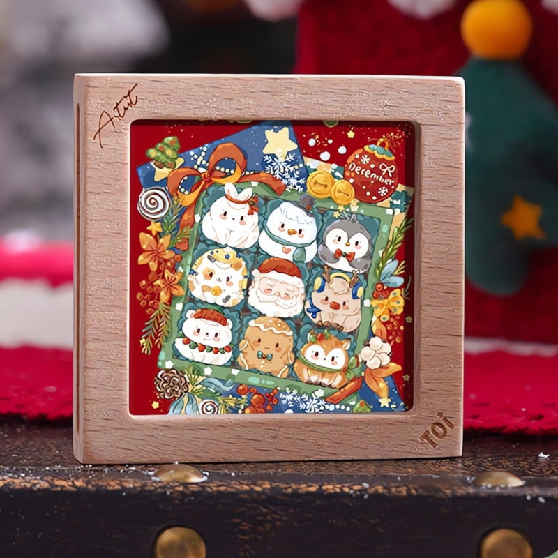 Completed Christmas Cute Gift Box puzzle displayed inside a wooden frame on a festive background.