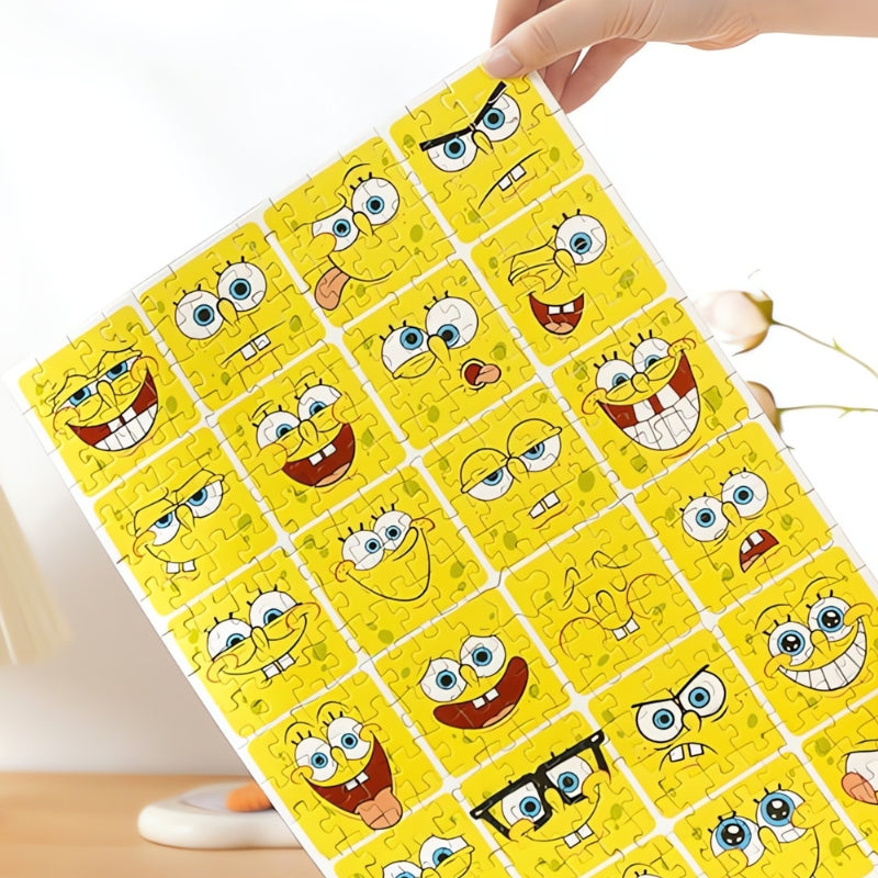 Completed TOI 300 piece puzzle held up showing SpongeBob SquarePants in a range of silly and fun moods