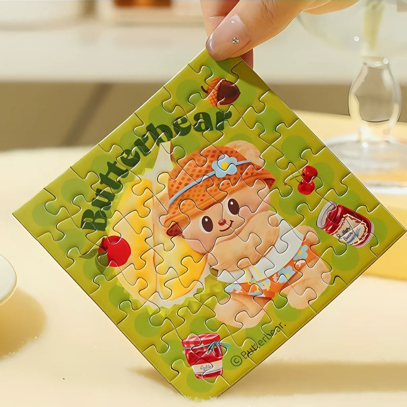 Hand holding Butterbear Berry Fun mini puzzle
